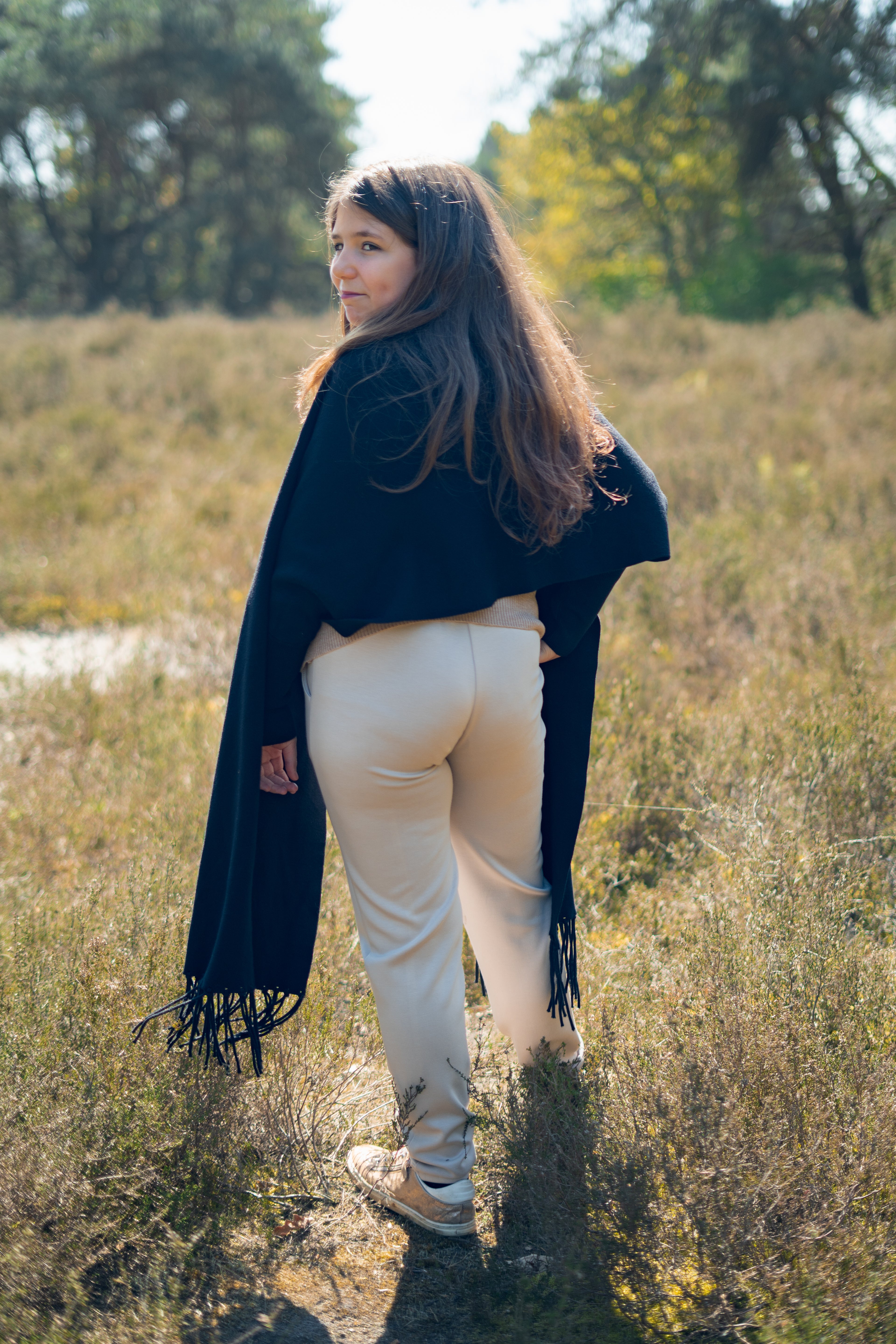 Zwarte poncho