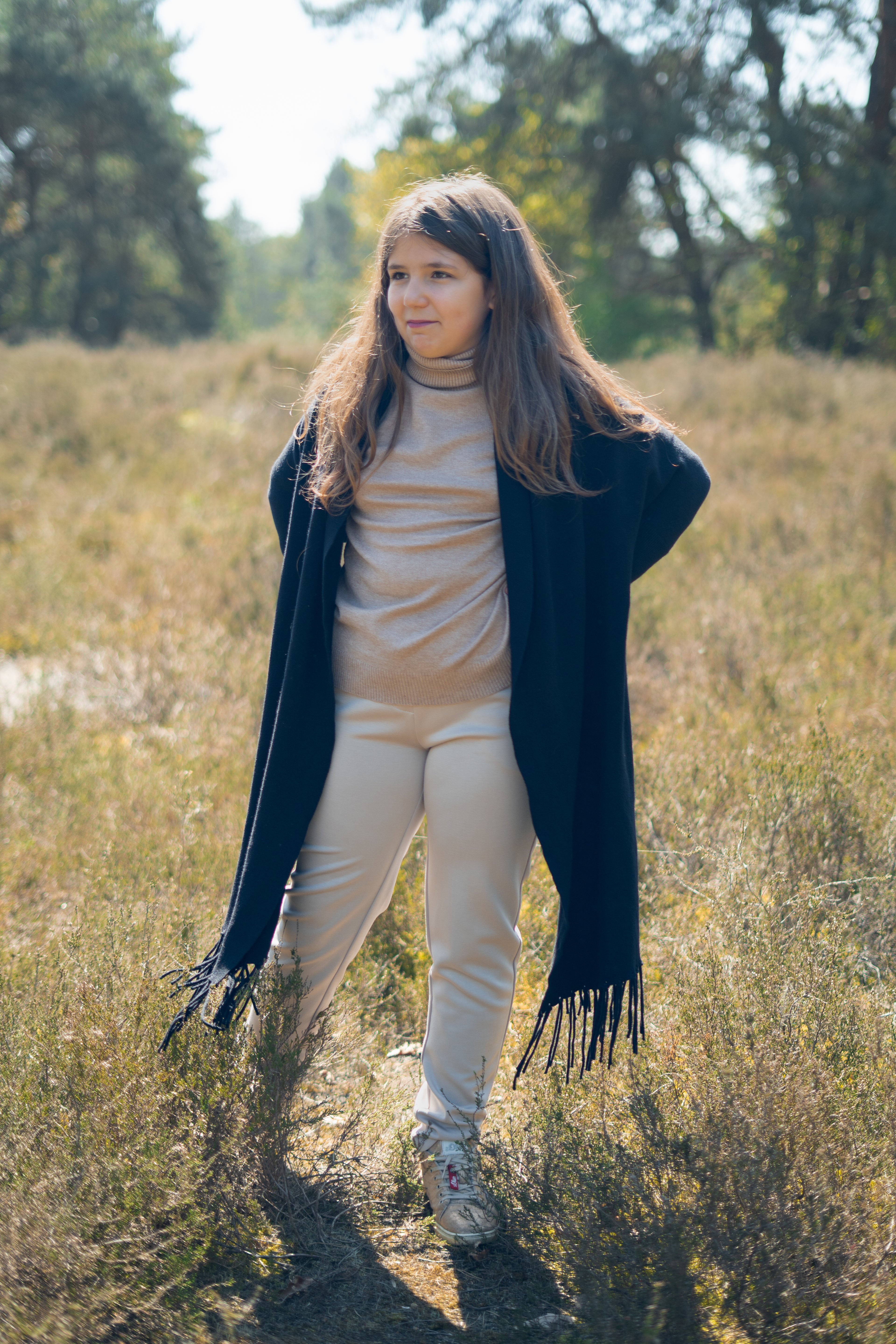 Zwarte poncho